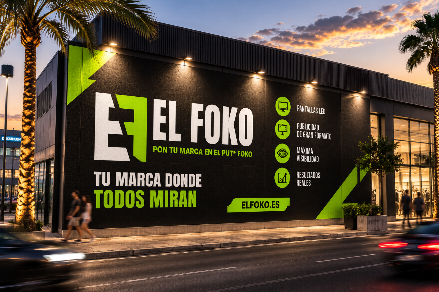 Mural publicitario ElFoko en fachada urbana al atardecer
